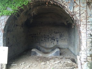 Holding facility for poison gas with a lot of names carved into the walls